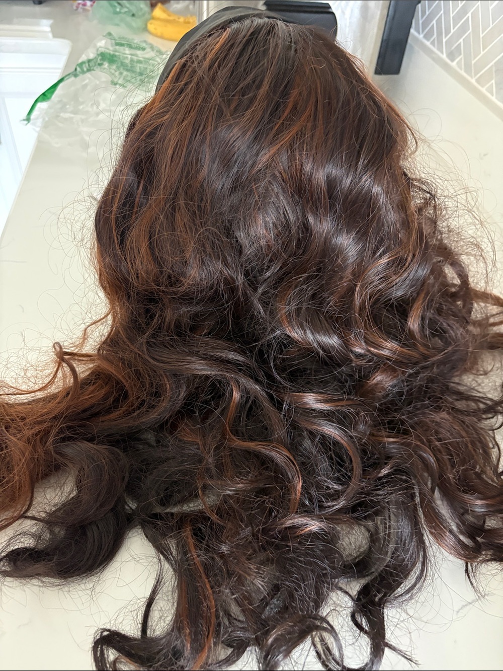 Natural-Look Brown Curly Women's Wig with Subtle Highlights